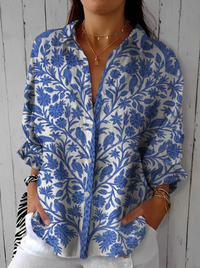 Vivienne – Blouse bleue fleurie