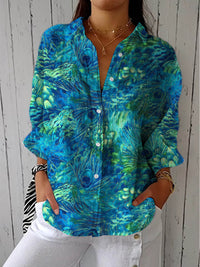 Patricia – Blouse bleue à imprimé nature